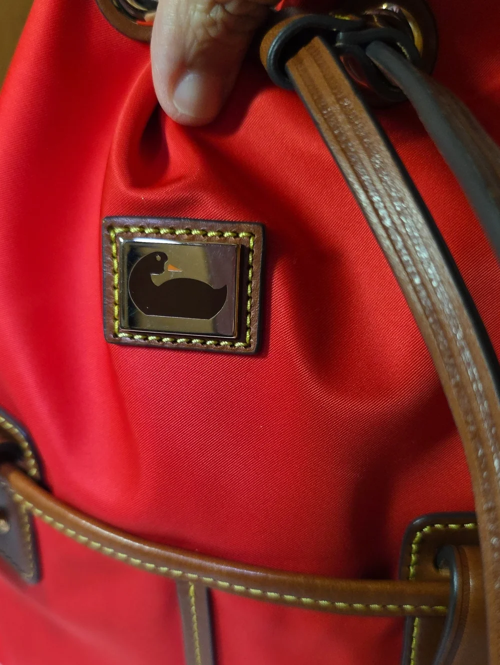 Dooney & Bourke Red Drawstring Bucket Bag with Brown Trim